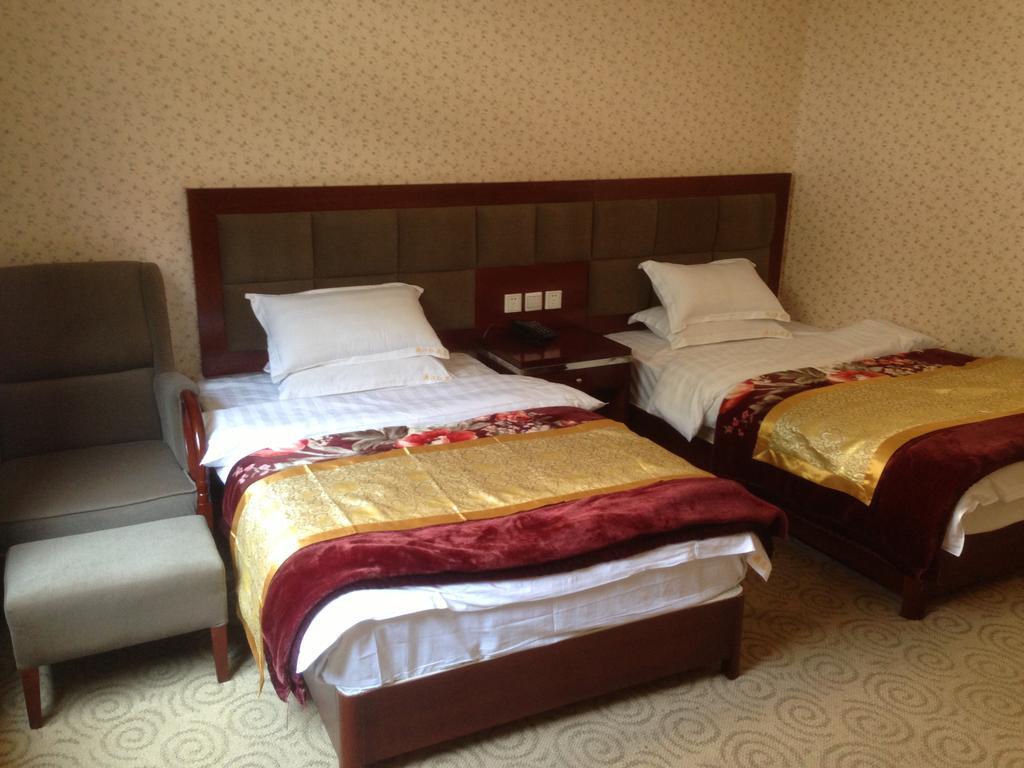 Jiuzhaigou Man Jiang Hong Hotel Habitación foto